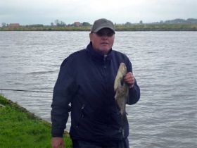 Wout met een mooie grote brasem.jpg